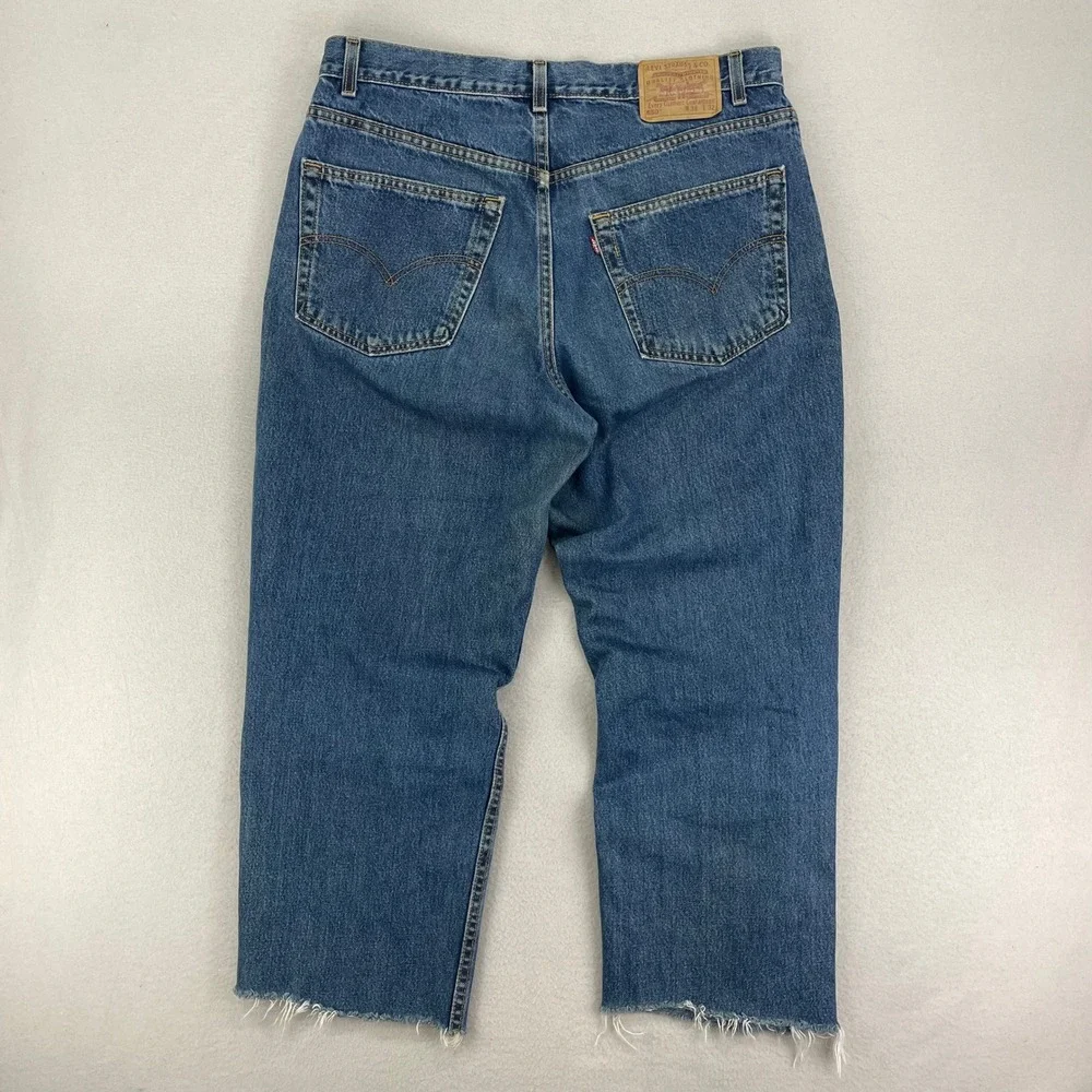 VTG Levi's Jeans 550 Mens 38x32‎ Blue Distressed Denim Relaxed made in USA Cut